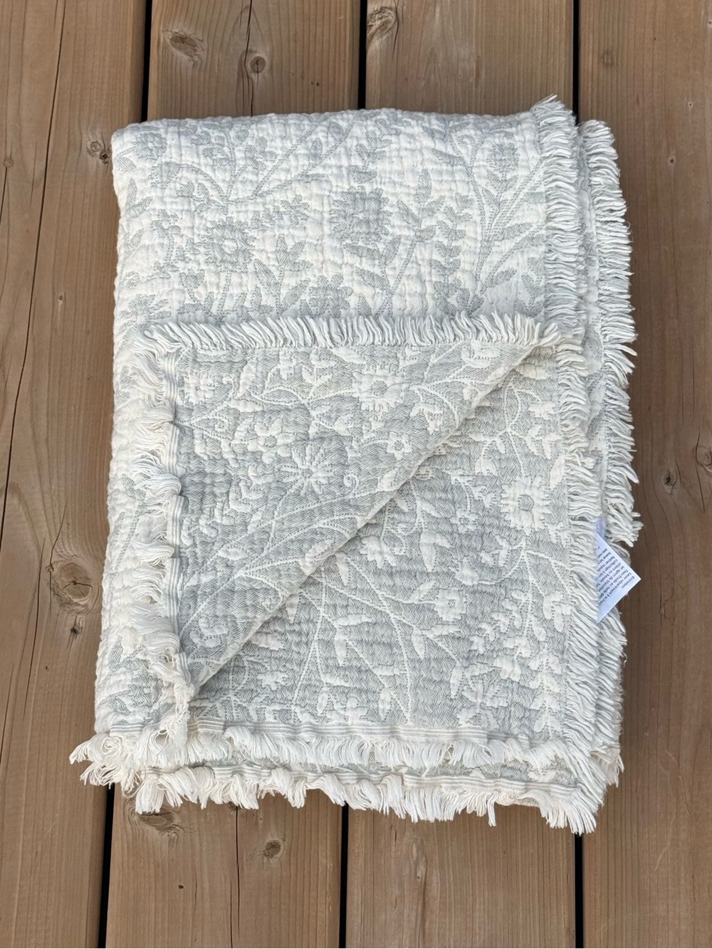 Textured Floral Fringe Throw Blanket in Light Blue and Cream
